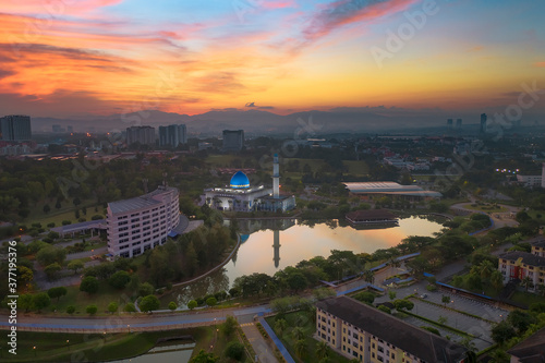 A sunrise scene of local muslim mosque taken via drone during a lockdown from Kuala Lumpur, Malaysia.
