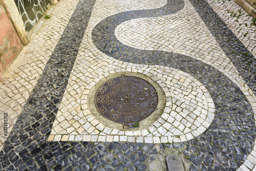 Portuguese pavement, named calacada in Setubal, Portugal.

