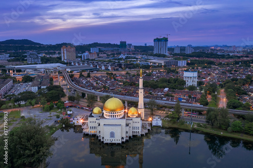 Photography A sunrise scene of local muslim mosque taken via drone during a lockdown from Kuala Lumpur, Malaysia
