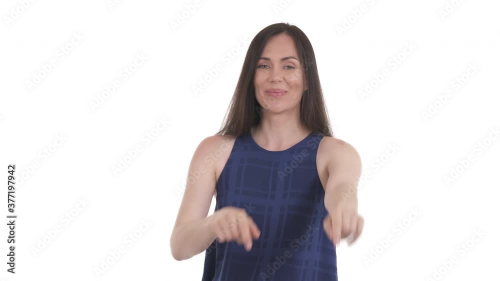 Cheerful Caucasian woman pointing to the front both hands approving something. You gesture. Isolated on white background Cheerful Caucasian woman pointing to the front both hands approving something. You gesture. Isolated on white background