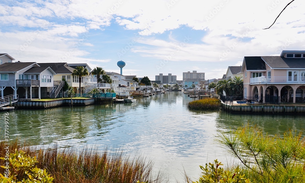 Waterfront homes with balconies and docks. Beautiful winter view in North Myrtle Beach, South Carolina, an attractive place for retirement. 