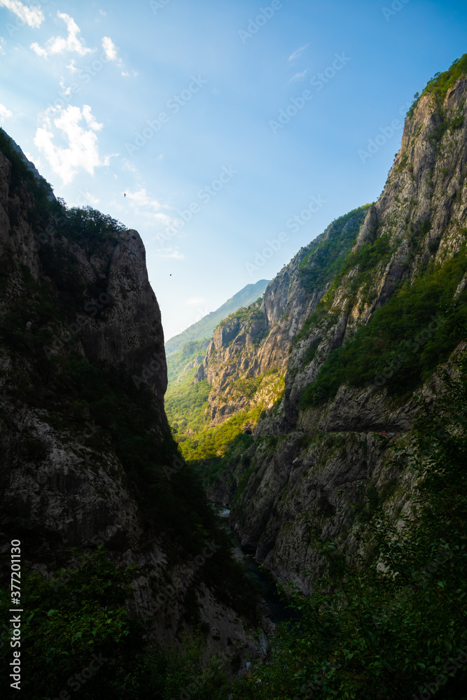 Fantastic deep canyon with a river in montenegro, mountain landscape sunrise, travel and tourism in Europe