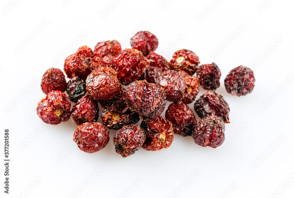 Dried Mexican hot Chile habanero seco chili offered as close-up on white background with copy space - free-form select Dried Mexican hot Chile habanero seco chili offered as close-up on white background with copy space - free-form select