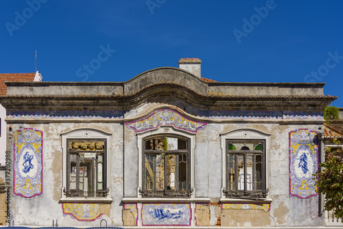 panels of polychrome azulejos on the walls of a beautiful ruined house in Setubal