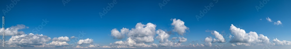 White cumulus clouds in blue sky panoramic high resolution background White cumulus clouds in blue sky panoramic high resolution background