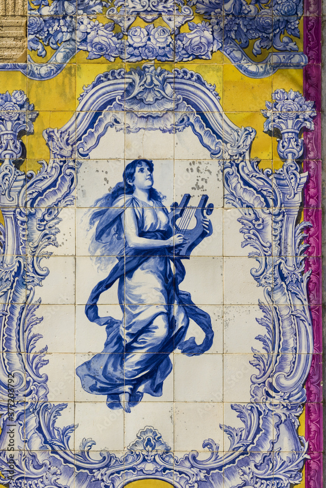 panels of polychrome azulejos on the walls of a beautiful ruined house in Setubal