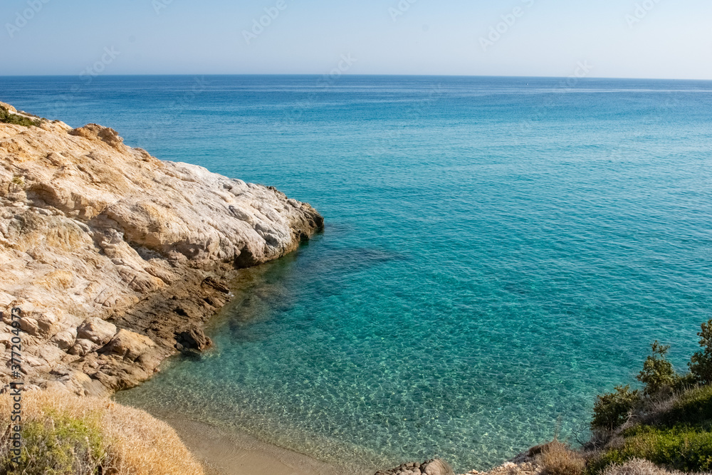 Aegean waters on the Livadi beach in Ikaria Island, Greece
