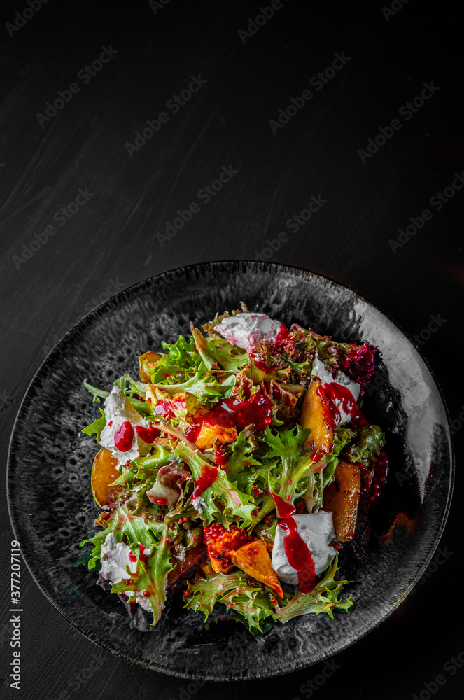 Plate of fresh salad with grilled chicken, pear, cream cheese in plate Plate of fresh salad with grilled chicken, pear, cream cheese in plate