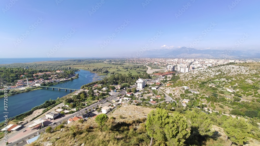 Panorama of the city with a bridge and a river