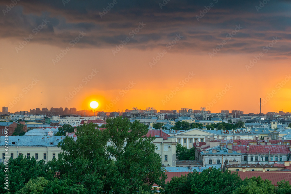 View of St. Isaac's Cathedral, Saint Petersburg city, Russia. Storm clouds on the horizon, beautiful cityscape in a thunder