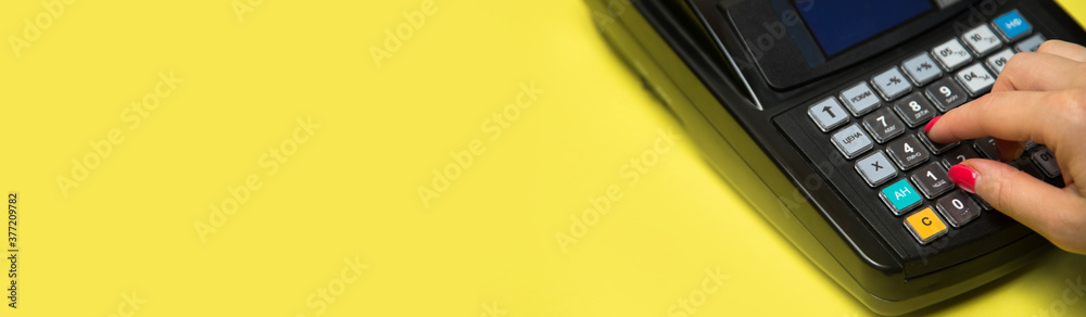 Cash register on yellow background. Cash register on yellow background.