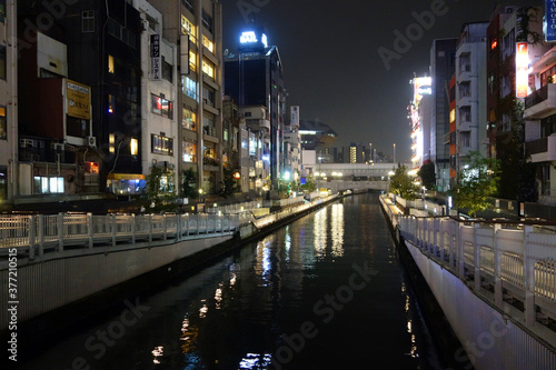 Dotonboti street in Namba is the best sightseeing attraction and famous place in Osaka with colorful and billboard light around area in Osaka, Japan photo