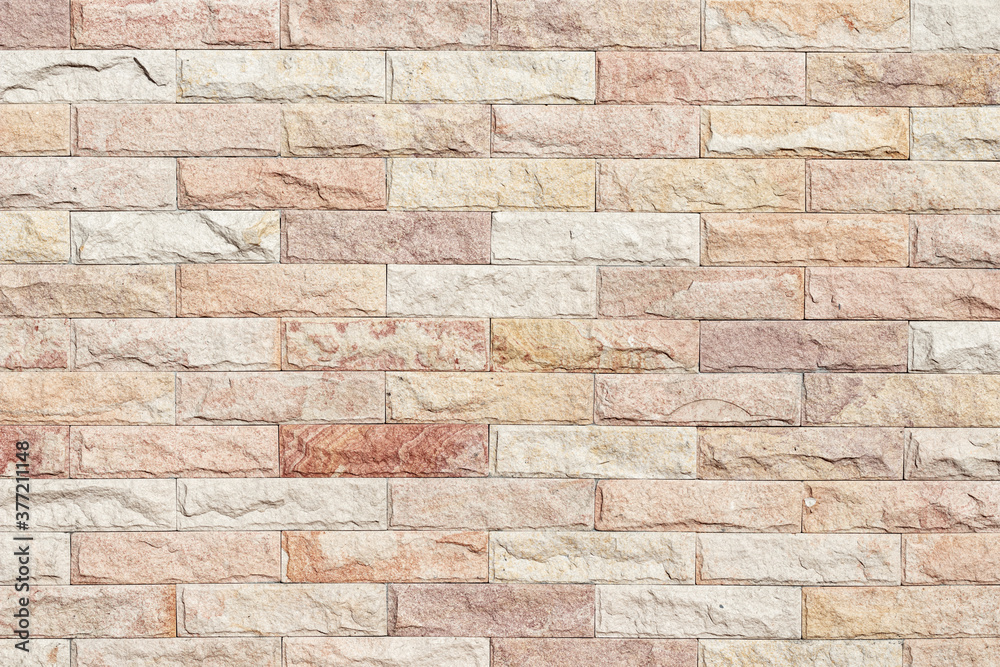 Background and texture stone cladding wall.