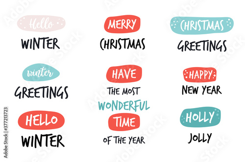 Set of Christmas holiday greeting text with doodle ornaments. © danceyourlife