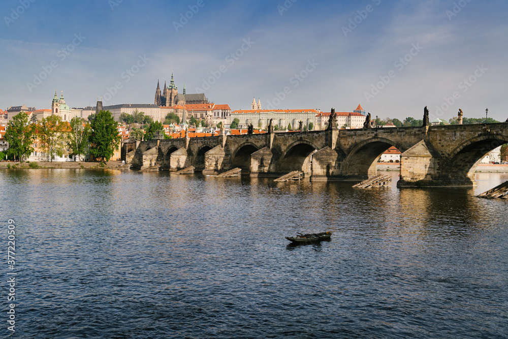 Obraz premium Old downtown of Prague. River Vltava and Charles bridge
