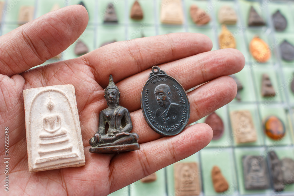 Small Buddha image or Thai Amulets & Talismans
