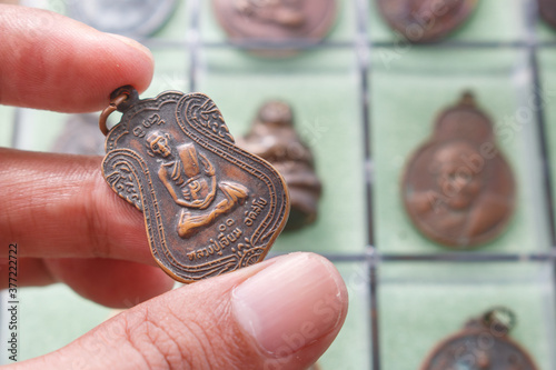 Small Buddha image or Thai Amulets & Talismans