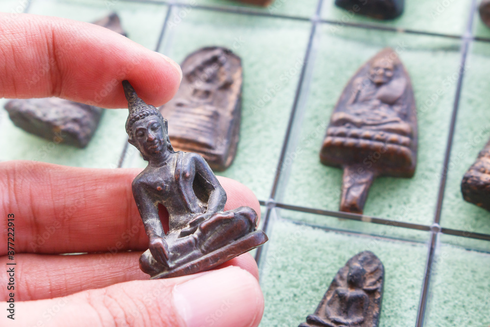 Small Buddha image or Thai Amulets & Talismans