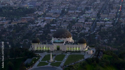 

Amazing view of the Griffith Observatory in Mount Hollywood. Crowded entrance lawn and observation deck. Los Angeles, California. Beautiful sky during sunset. Shot on Red Weapon 8K.