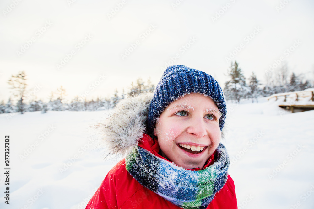 Cute boy outdoors on winter Cute boy outdoors on winter