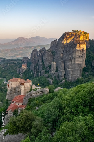 Vertical image of incredible aerial view of the Meteora rocks with Monastery on top © Pablo