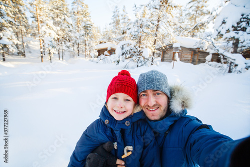 Father and daughter outdoors at winter