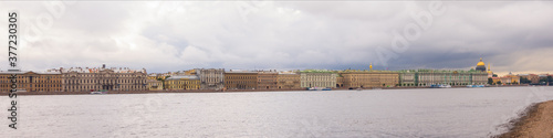 Panoramic view of the banks of the Neva River from the side of the Peter and Paul Fortress in St. Petersburg, Russia