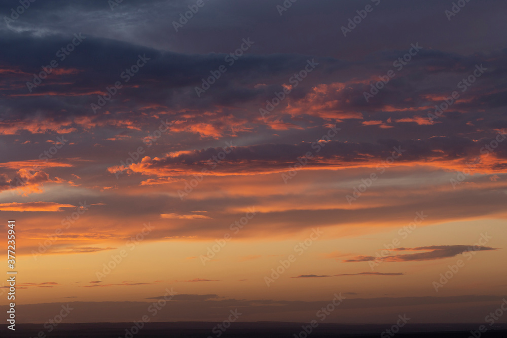 Purple-magenta clouds. Tragic gloomy sky. Landscape with bloody sunset. Fantastic skies on the planet earth. Twilight, nightfall. Blackout. Purple-magenta clouds. Tragic gloomy sky. Landscape with bloody sunset. Fantastic skies on the planet earth. Twilight, nightfall. Blackout.