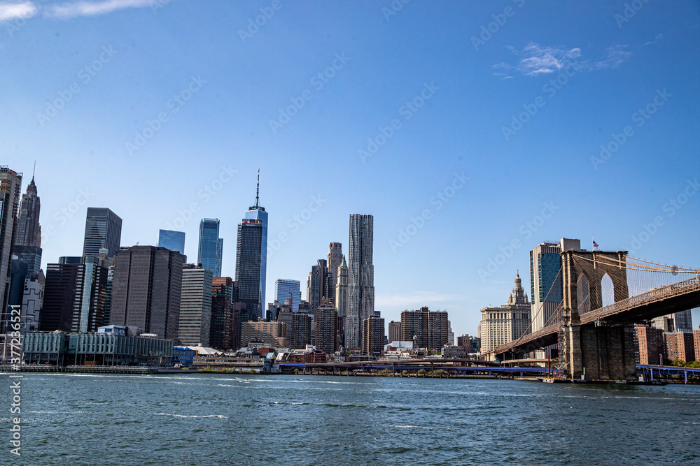 A view of the Manhattan skyline from the East River in New York City.