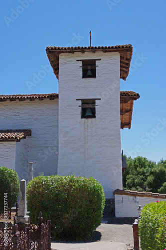 Historic old Spanish San Jose mission in Fremont under a bright blue California summer sky photo
