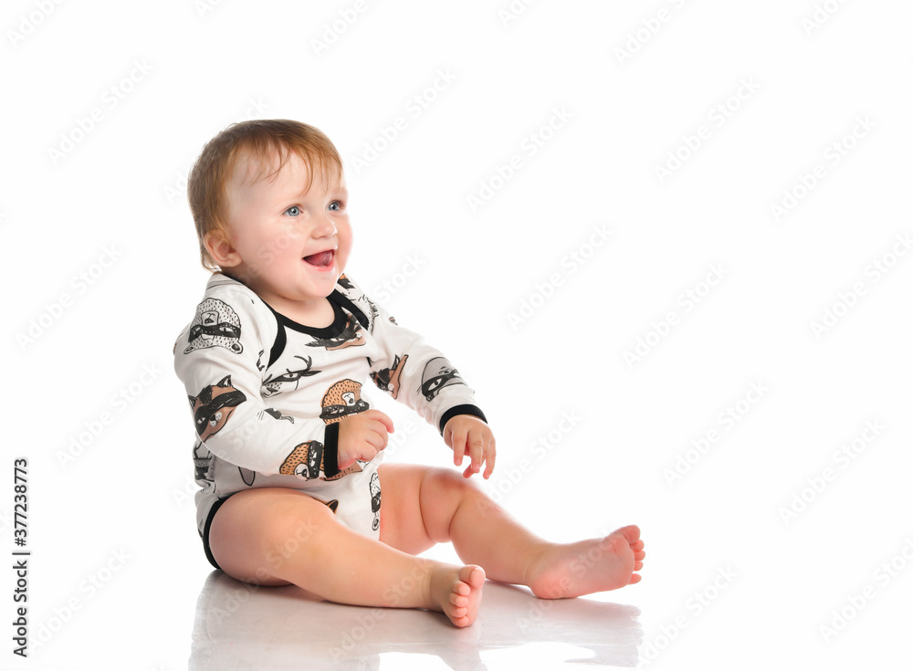 Close up portrait of a happy baby boy on a white background. Close up portrait of a happy baby boy on a white background.