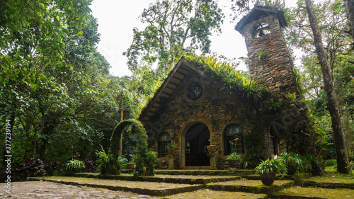 A nice church made of stone and inside a rain forest in Nicaragua photo