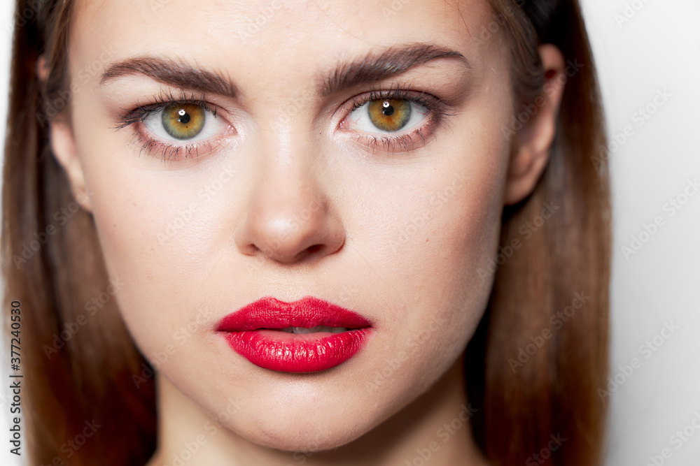 Woman with red lips face close up studio Woman with red lips face close up studio