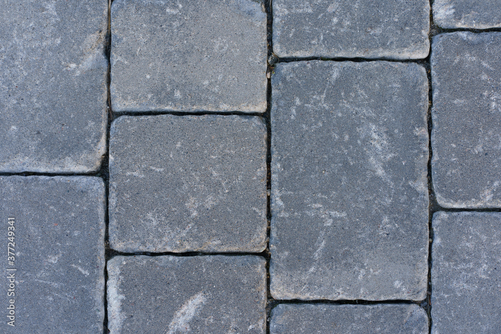 paving stone on the sidewalk paving stone on the sidewalk