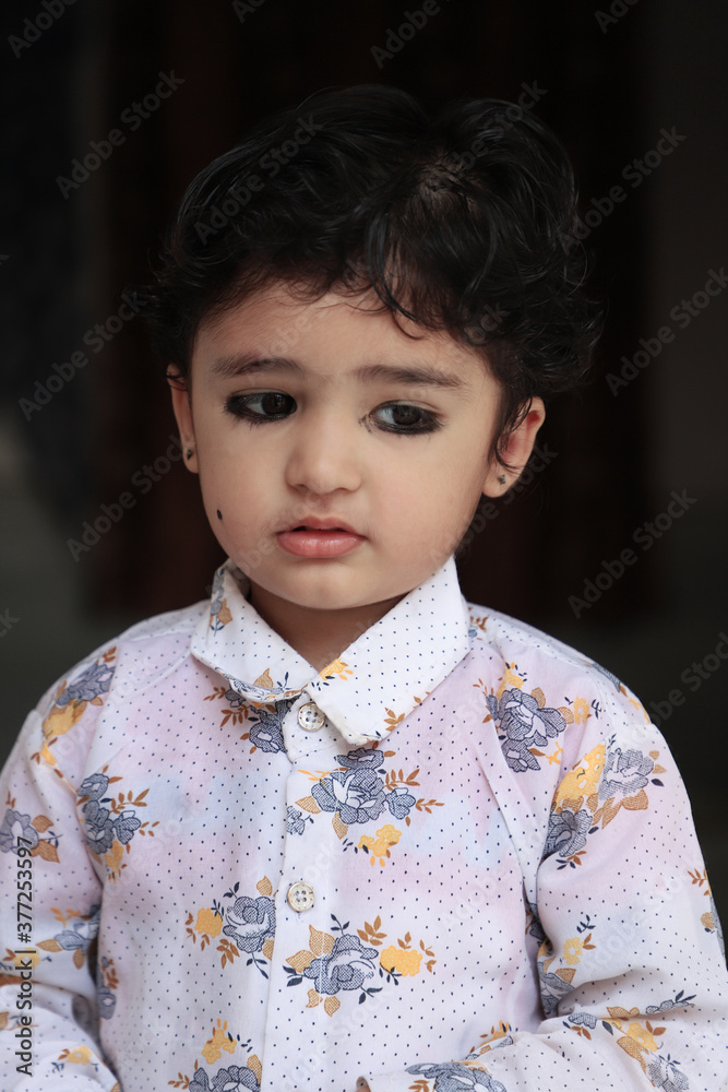 Cute Indian Boy Kid Giving Pose To Camera in very different emotions. Cute Indian Boy Kid Giving Pose To Camera in very different emotions.