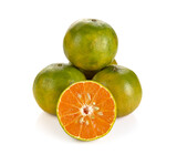 green tangerine on white background