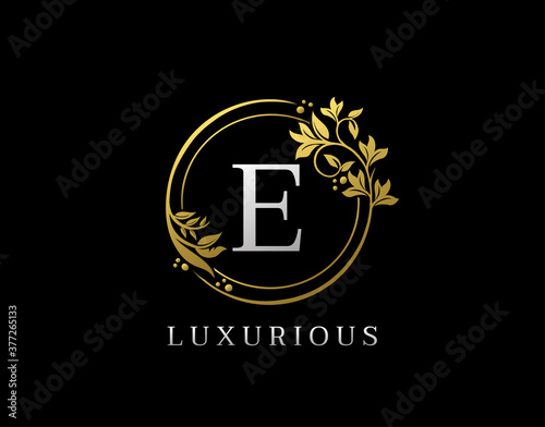 Luxury Circle E Letter Floral Design. Elegant Gold E Royal Logo Icon.
