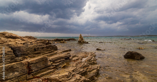 Dramatic storm clouds and rain over the Adriatic Sea in summer © Calin Tatu