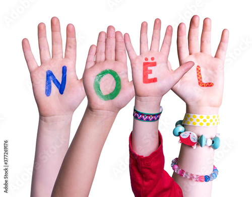 Children Hands Building Colorful French Word Noel Means Christmas. White Isolated Background