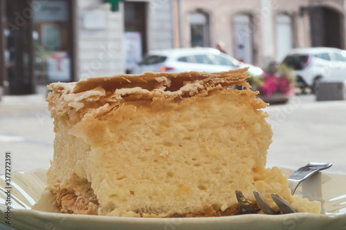 A cremeschnitte or krempita, kremšnita is a custard and chantilly cream cake dessert popular in several Central European countries.