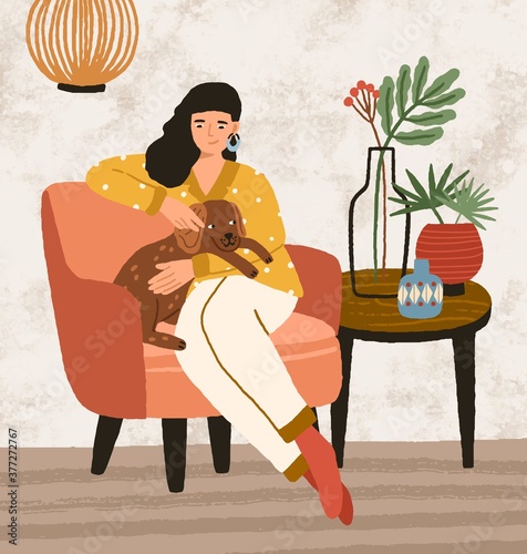 Smiling female hugging and stroking cute dog sitting on armchair vector flat illustration. Joyful woman spending time with lovely domestic animal at cozy interior. Happy pet owner relaxing at home