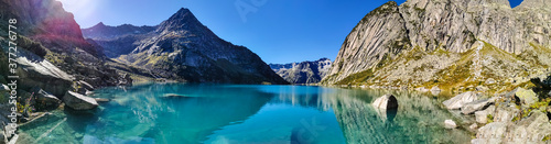 Gelmersee. Dam in the Swiss alps for Hydro power. Clear Blue lake © Peter Hofstetter