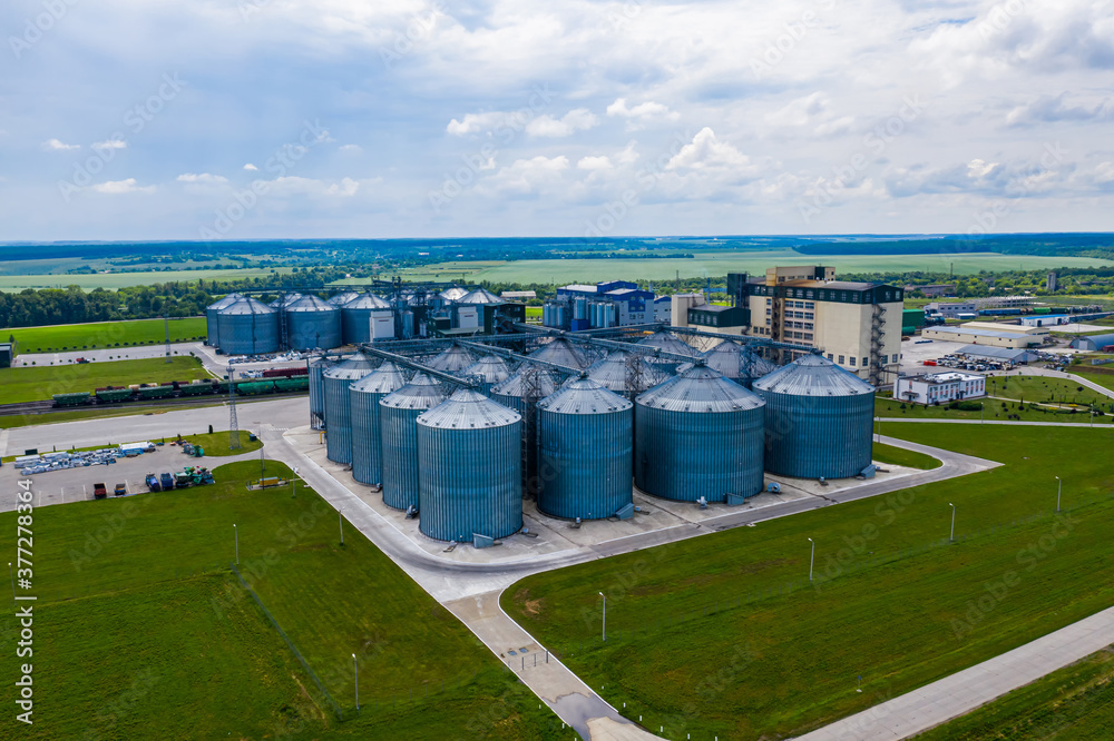 New factory in field. View from above. Ecological production. Bio gas plant. Sustainable production. New factory in field. View from above. Ecological production. Bio gas plant. Sustainable production.