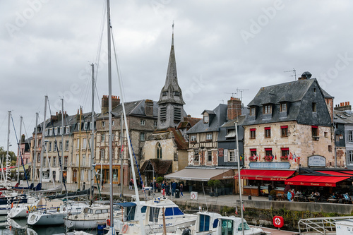 View of the picturesque harbour of Honfleur, yachts and old houses, Normandy, France