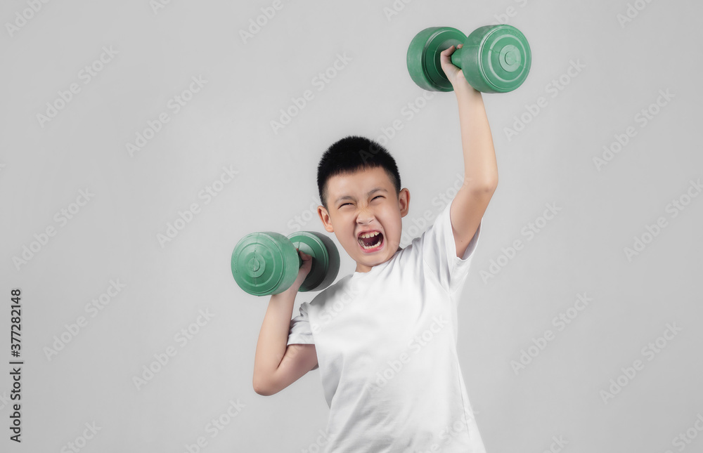 Asian boys studio shot portrait on gray background Asian boys studio shot portrait on gray background