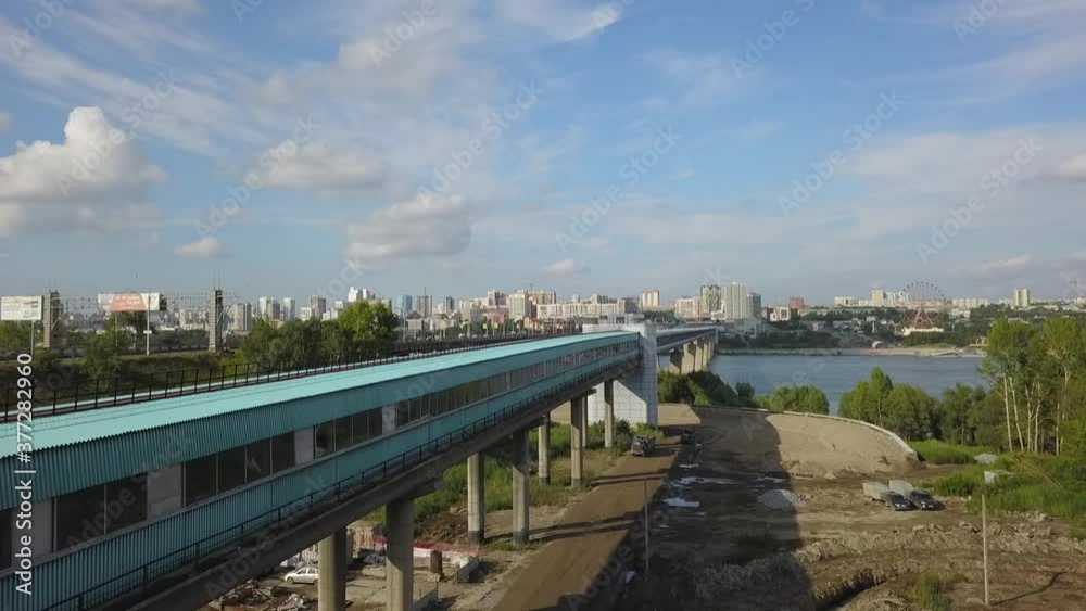 flying camera flies over the metro bridge and the road bridge in Novosibirsk flying camera flies over the metro bridge and the road bridge in Novosibirsk