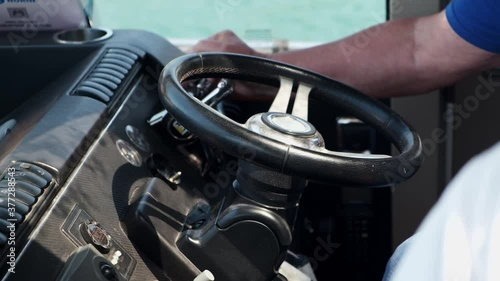 Wallpaper Mural yacht with instruments and steering wheel the hands of the captain. Close up. speedboat or luxury yacht ship. navigation. man steering Torontodigital.ca