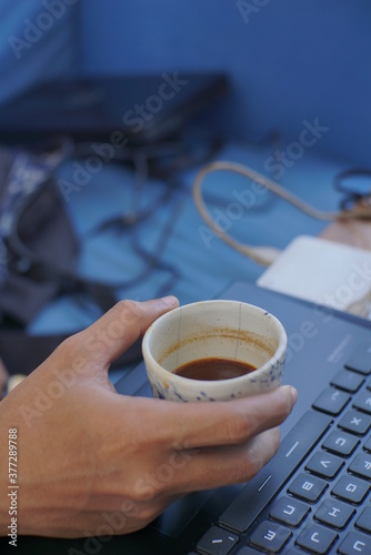 a cup espresso on a hand