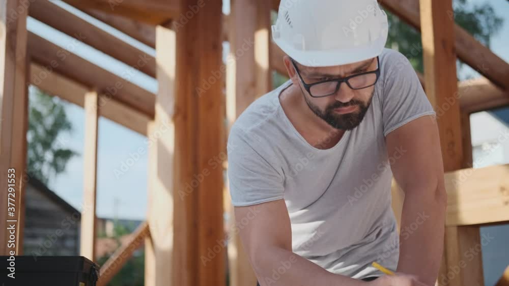 Designer engineer makes a project of the future house, draws