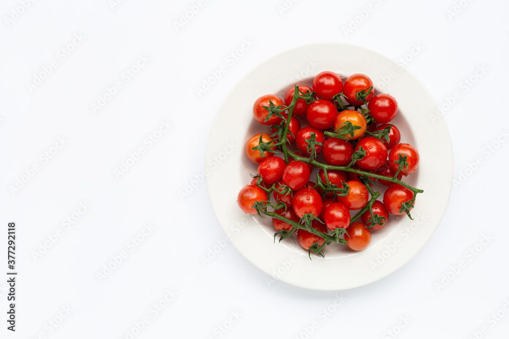Fresh tomatoes, whole and half cut isolated on white background. Fresh tomatoes, whole and half cut isolated on white background.